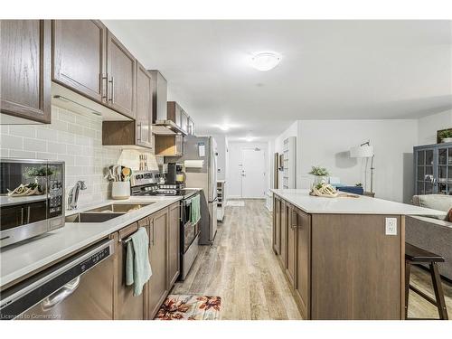 220-1 Redfern Avenue Avenue, Hamilton, ON - Indoor Photo Showing Kitchen With Double Sink