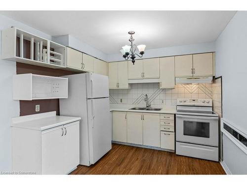 14-1255 Upper Gage Avenue, Hamilton, ON - Indoor Photo Showing Kitchen With Double Sink