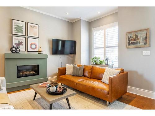 220 Hughson Street N, Hamilton, ON - Indoor Photo Showing Living Room With Fireplace