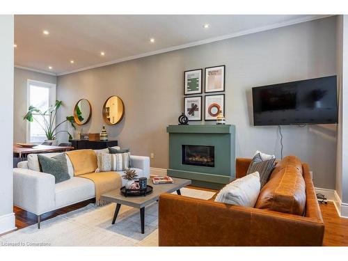 220 Hughson Street N, Hamilton, ON - Indoor Photo Showing Living Room With Fireplace