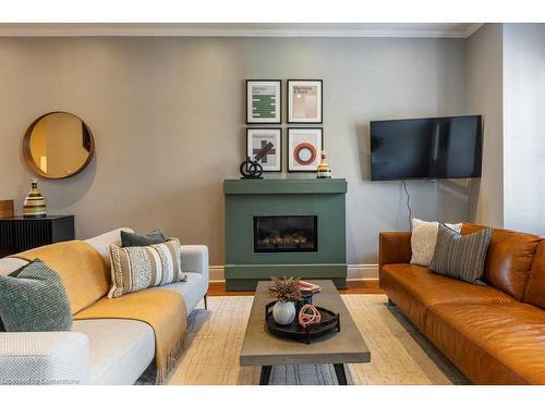 220 Hughson Street N, Hamilton, ON - Indoor Photo Showing Living Room With Fireplace