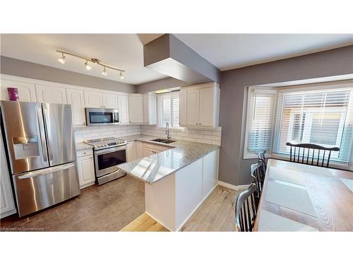 6436 Armstrong Drive, Niagara Falls, ON - Indoor Photo Showing Kitchen With Stainless Steel Kitchen With Double Sink With Upgraded Kitchen