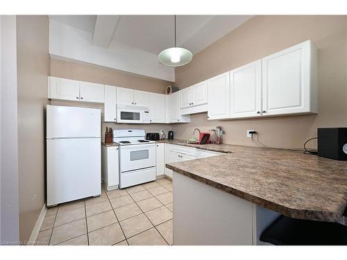 105-6365 Drummond Road, Niagara Falls, ON - Indoor Photo Showing Kitchen With Double Sink