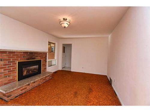 69 San Francisco Avenue, Hamilton, ON - Indoor With Fireplace