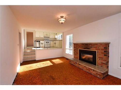 69 San Francisco Avenue, Hamilton, ON - Indoor Photo Showing Living Room With Fireplace