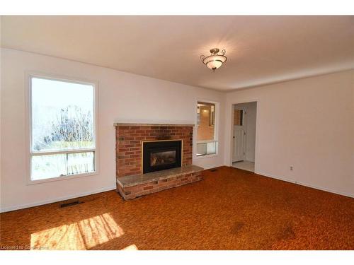 69 San Francisco Avenue, Hamilton, ON - Indoor Photo Showing Living Room With Fireplace