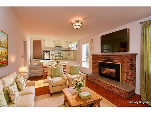 69 San Francisco Avenue, Hamilton, ON - Indoor Photo Showing Living Room With Fireplace