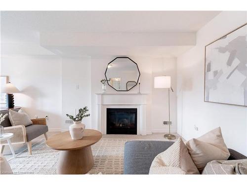 30-4241 Sarazen Drive, Burlington, ON - Indoor Photo Showing Living Room With Fireplace