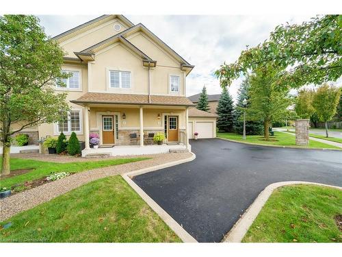 2-61 Cloverleaf Drive, Ancaster, ON - Outdoor With Deck Patio Veranda With Facade