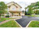 2-61 Cloverleaf Drive, Ancaster, ON  - Outdoor With Deck Patio Veranda With Facade 