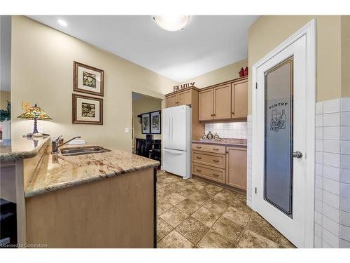 2-61 Cloverleaf Drive, Ancaster, ON - Indoor Photo Showing Kitchen With Double Sink