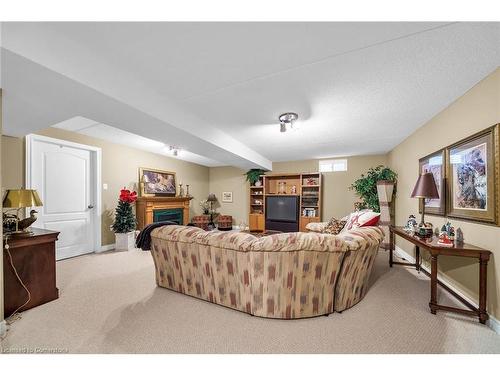 2-61 Cloverleaf Drive, Ancaster, ON - Indoor With Fireplace