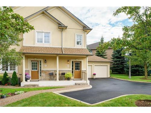 2-61 Cloverleaf Drive, Ancaster, ON - Outdoor With Deck Patio Veranda With Facade