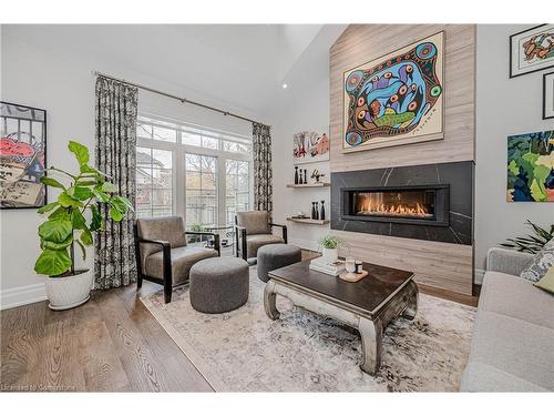 21-4360 Millcroft Park Drive, Burlington, ON - Indoor Photo Showing Living Room With Fireplace