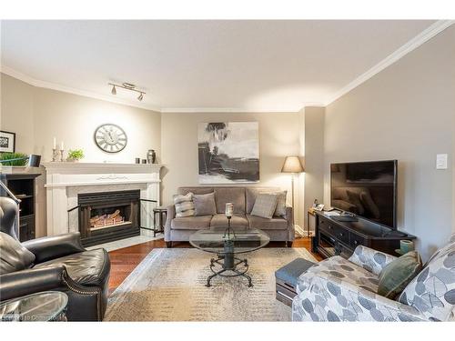 4-286 Hamilton Drive, Ancaster, ON - Indoor Photo Showing Living Room With Fireplace