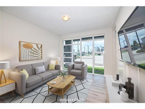 103-10 Concord Place, Grimsby, ON - Indoor Photo Showing Living Room