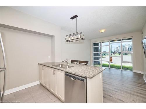 103-10 Concord Place, Grimsby, ON - Indoor Photo Showing Kitchen With Double Sink