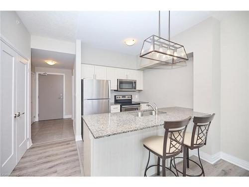 103-10 Concord Place, Grimsby, ON - Indoor Photo Showing Kitchen With Stainless Steel Kitchen With Double Sink With Upgraded Kitchen