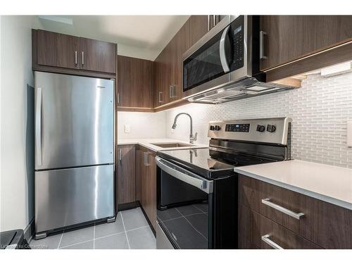 101-467 Charlton Avenue E, Hamilton, ON - Indoor Photo Showing Kitchen With Stainless Steel Kitchen