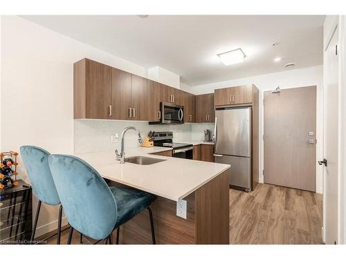 101-467 Charlton Avenue E, Hamilton, ON - Indoor Photo Showing Kitchen With Stainless Steel Kitchen