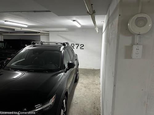 304-2060 Lakeshore Road, Burlington, ON - Indoor Photo Showing Garage