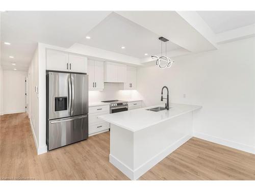 Main-34 Crooks Street, Hamilton, ON - Indoor Photo Showing Kitchen With Stainless Steel Kitchen With Double Sink With Upgraded Kitchen