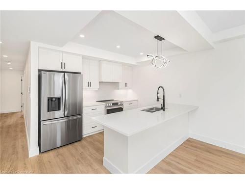 Main-34 Crooks Street, Hamilton, ON - Indoor Photo Showing Kitchen With Stainless Steel Kitchen With Double Sink With Upgraded Kitchen