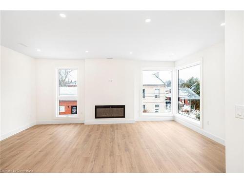 2Nd Floor-34 Crooks Street, Hamilton, ON - Indoor Photo Showing Other Room With Fireplace