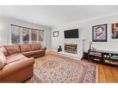 375 Clarendon Drive, Ancaster, ON - Indoor Photo Showing Living Room With Fireplace