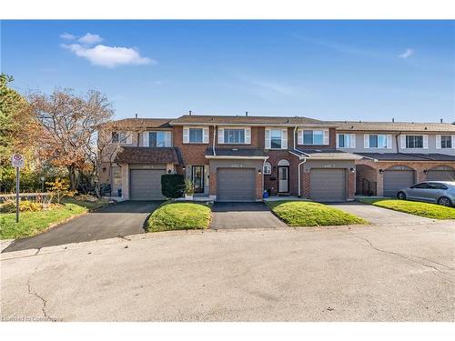 8-4192 Longmoor Drive, Burlington, ON - Outdoor With Facade