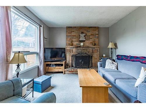 463 Knightsbridge Crescent, Ancaster, ON - Indoor Photo Showing Living Room With Fireplace