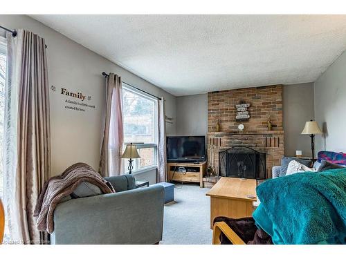 463 Knightsbridge Crescent, Ancaster, ON - Indoor Photo Showing Living Room With Fireplace