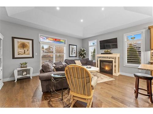 13-418 Nelson Street, Port Dover, ON - Indoor Photo Showing Living Room With Fireplace