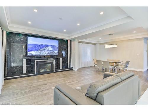 5-1261 Mohawk Road, Ancaster, ON - Indoor Photo Showing Living Room With Fireplace