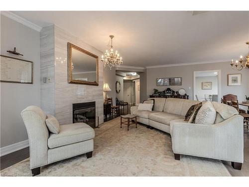 311-430 Pearl Street, Burlington, ON - Indoor Photo Showing Living Room With Fireplace