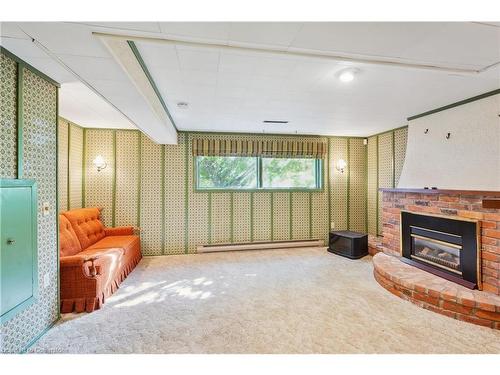 9 Briarsdale Drive, St. Catharines, ON - Indoor Photo Showing Other Room With Fireplace