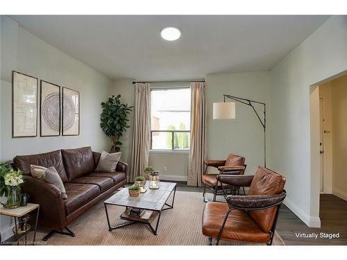 64 Crooks Street, Hamilton, ON - Indoor Photo Showing Living Room