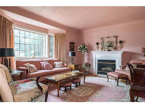 144 Brantdale Avenue, Hamilton, ON - Indoor Photo Showing Living Room With Fireplace