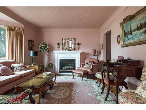 144 Brantdale Avenue, Hamilton, ON - Indoor Photo Showing Living Room With Fireplace