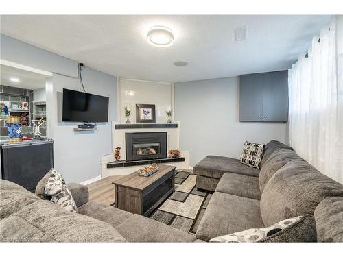 3395 Tisdale Road, Mount Hope, ON - Indoor Photo Showing Living Room With Fireplace