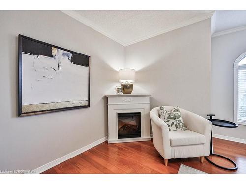 B406-216 Plains Road W, Burlington, ON - Indoor With Fireplace