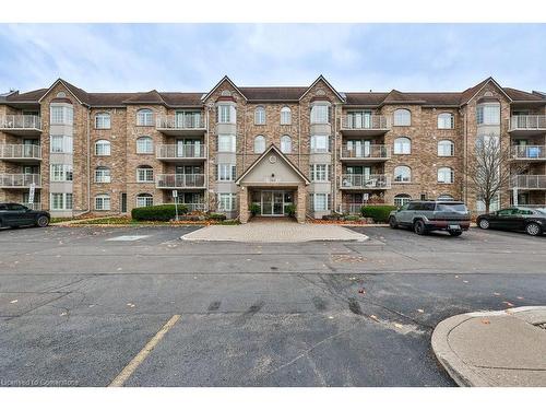 B406-216 Plains Road W, Burlington, ON - Outdoor With Balcony With Facade