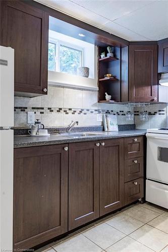 256 Charlton Avenue E, Hamilton, ON - Indoor Photo Showing Kitchen With Double Sink