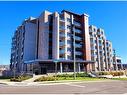 503-30 Hamilton Street S, Waterdown, ON  - Outdoor With Balcony With Facade 