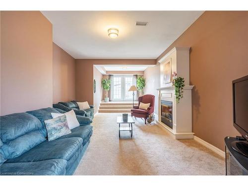 8503 Greenfield Crescent, Niagara Falls, ON - Indoor Photo Showing Living Room With Fireplace