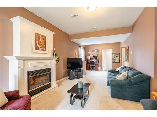 8503 Greenfield Crescent, Niagara Falls, ON - Indoor Photo Showing Living Room With Fireplace