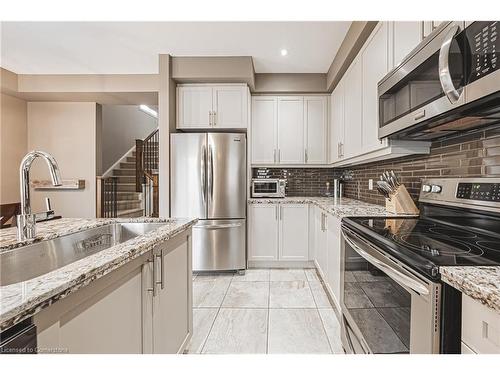 4-2220 Queensway Drive, Burlington, ON - Indoor Photo Showing Kitchen With Stainless Steel Kitchen With Upgraded Kitchen