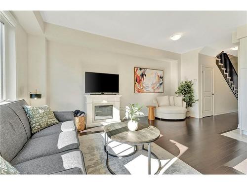 7 Freedom Crescent, Mount Hope, ON - Indoor Photo Showing Living Room With Fireplace