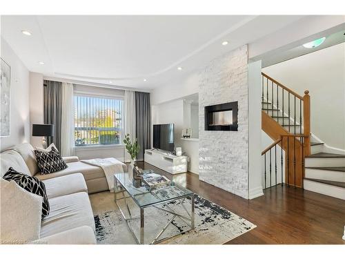 176-1221 Dundix Road, Mississauga, ON - Indoor Photo Showing Living Room With Fireplace