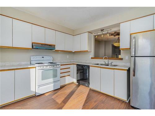 18-72 Stone Church Road W, Hamilton, ON - Indoor Photo Showing Kitchen With Double Sink